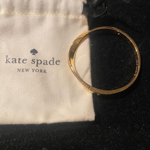 KATE SPADE gold bracelet with diamond detail on curve of band. Opens with clasp - Picture 2 of 4